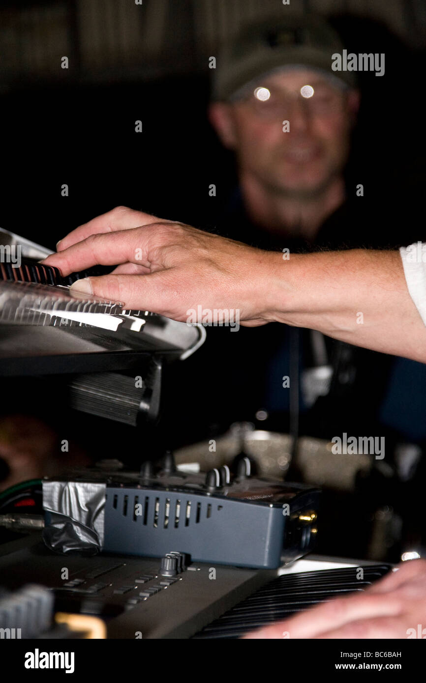 Closeup of a musician`s hands in action playing the keyboards during a Blues gig at The Town bar in Dundee,UK Stock Photo